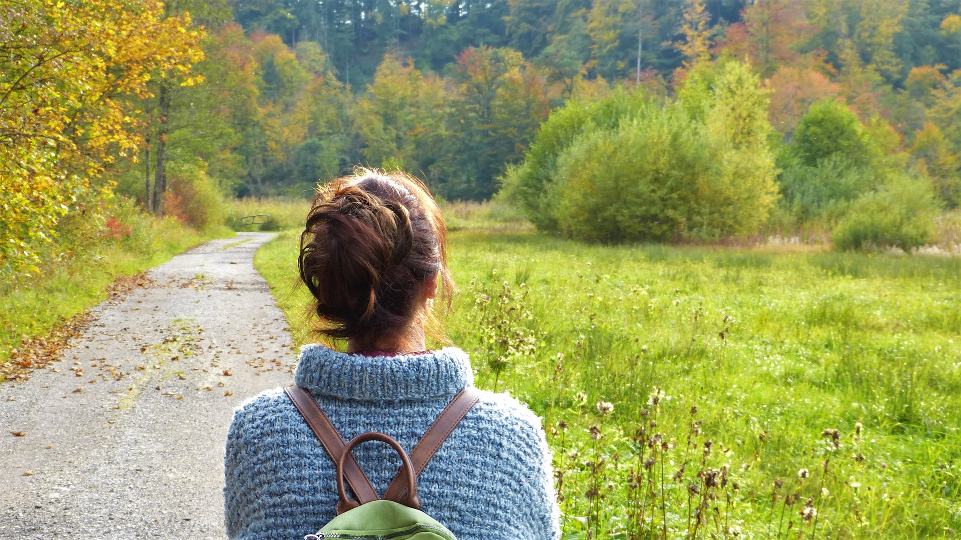 woman hiking in woods