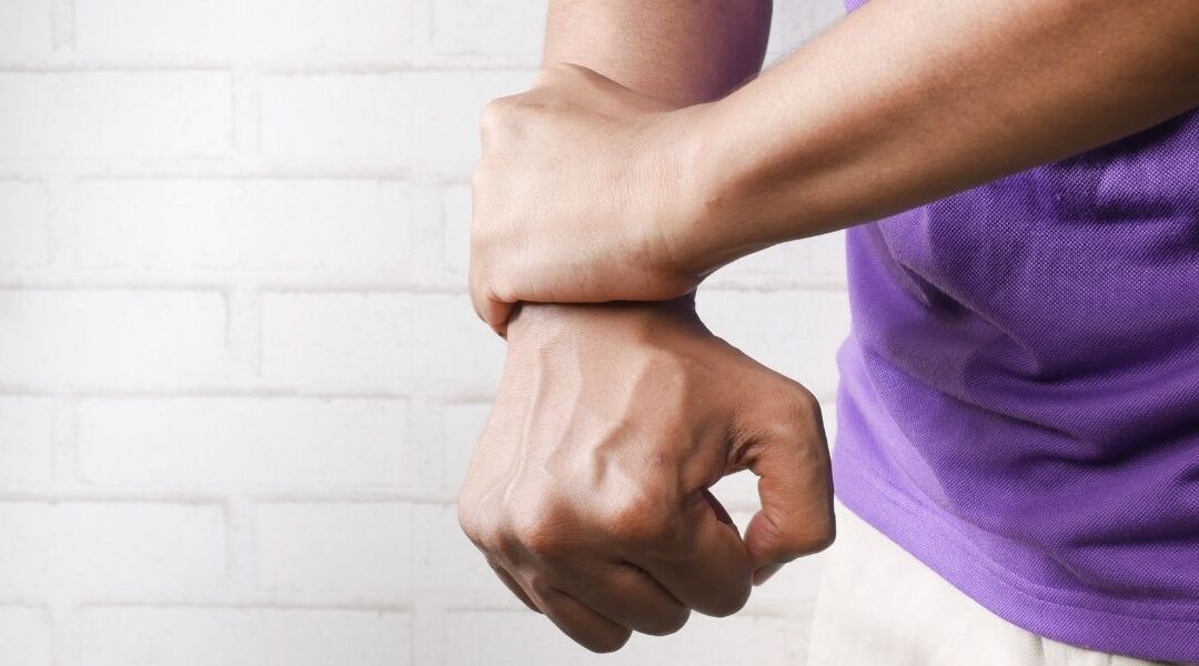 person holding wrist